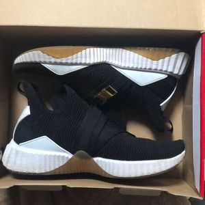 Puma Black-Metallic Gold : Defy Mid Varsity